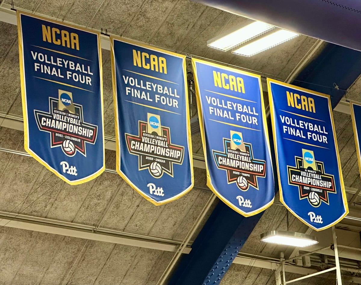 The rafters of Pitt's Fitzgerald Field House show four banners showing the volleyball's four straight NCAA Final Four appearances