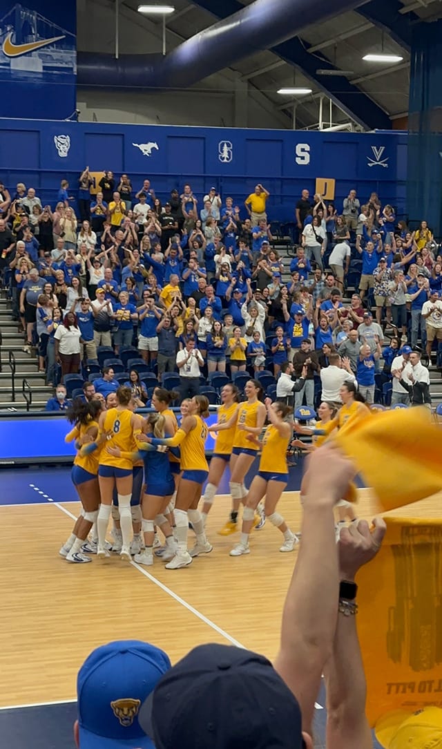 Screenshot shows Pitt fans and Pitt players celebrating match point over Georgia Tech at Fitzgerald Field House