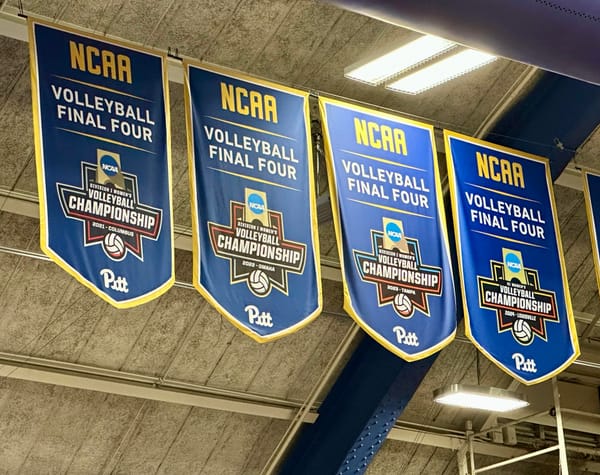 The rafters of Pitt's Fitzgerald Field House show four banners showing the volleyball's four straight NCAA Final Four appearances