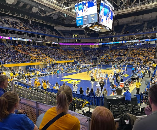A view of the Petersen Events Center from one of the corners during a 2025 match against Louisville. The lower bowl is mostly full.